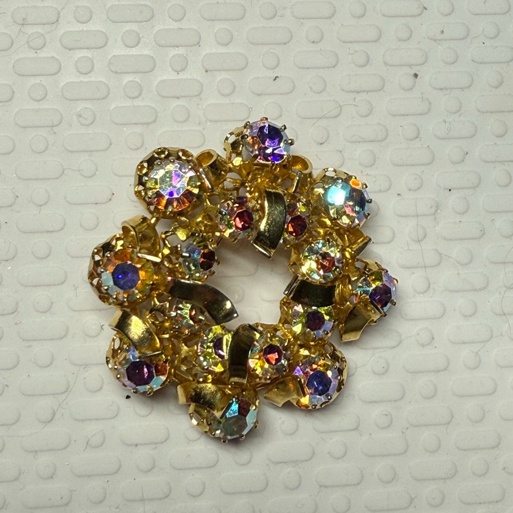 Elegant Gold and Purple Brooch